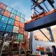 Container loading in a Cargo freight ship with industrial crane.